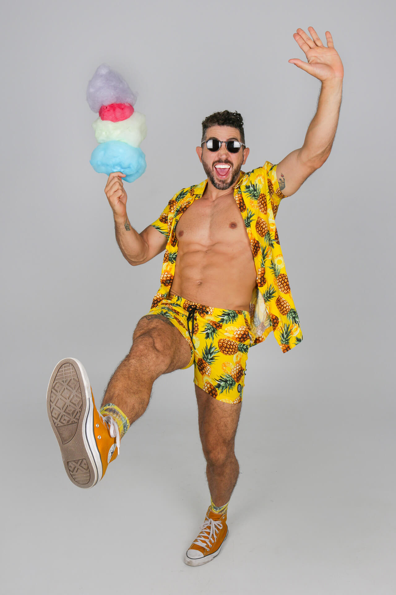Fairy Floss Collective boy in yellow balancing fairy floss